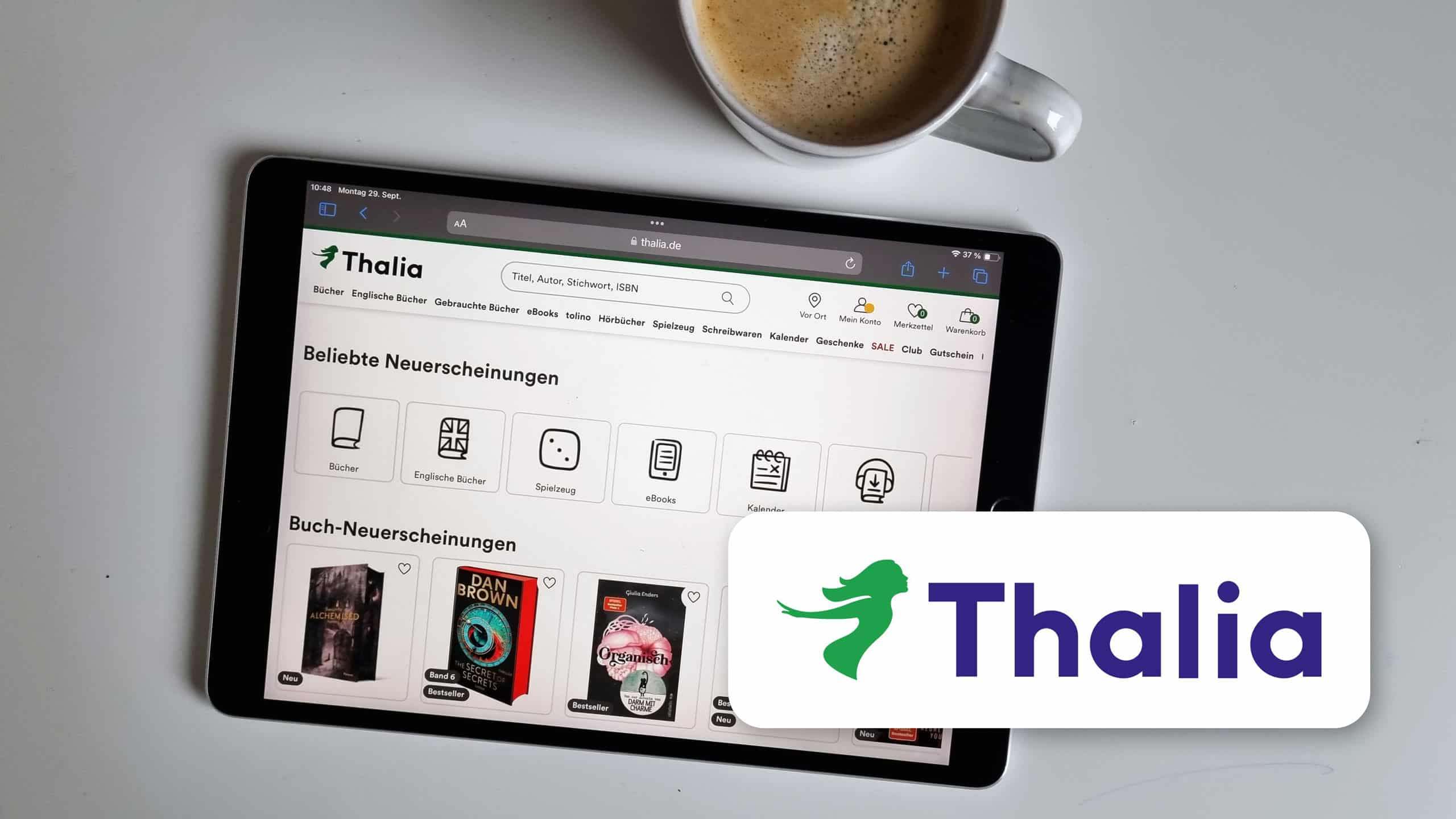 Foto eines Ipads, auf dem die Website von Thalia zu sehen ist. Im Vordergrund ist das Logo von Thalia zu sehen.